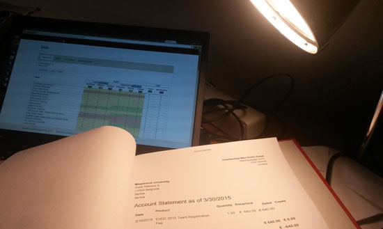 A messy desk. Registration generally requires a lot of documentation and paper-work alongside the virtual conversations. Software like Debreg can significantly reduce the workload.