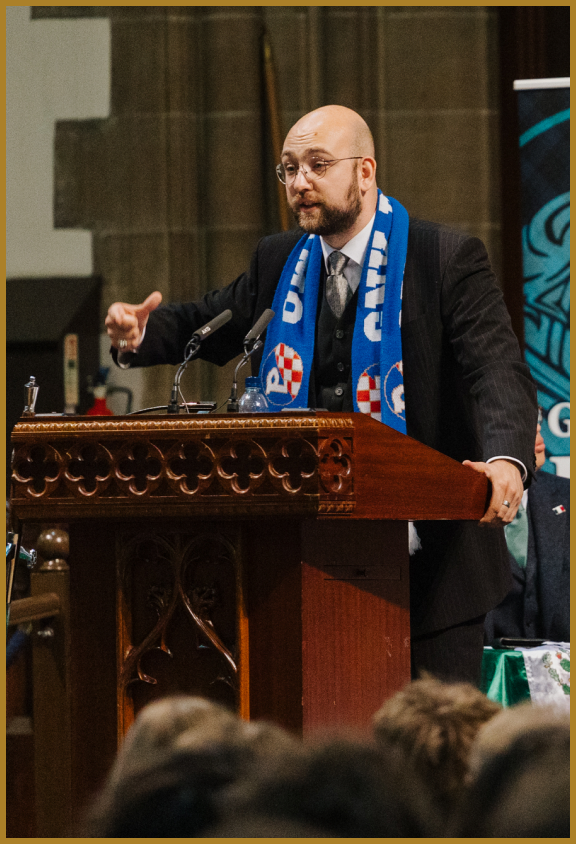 A speaker addressing the EUDC audience